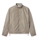 Lightweight comfort, fast-drying performance, and minimalist design. Image of  WHITESPACE Windbreaker Jacket