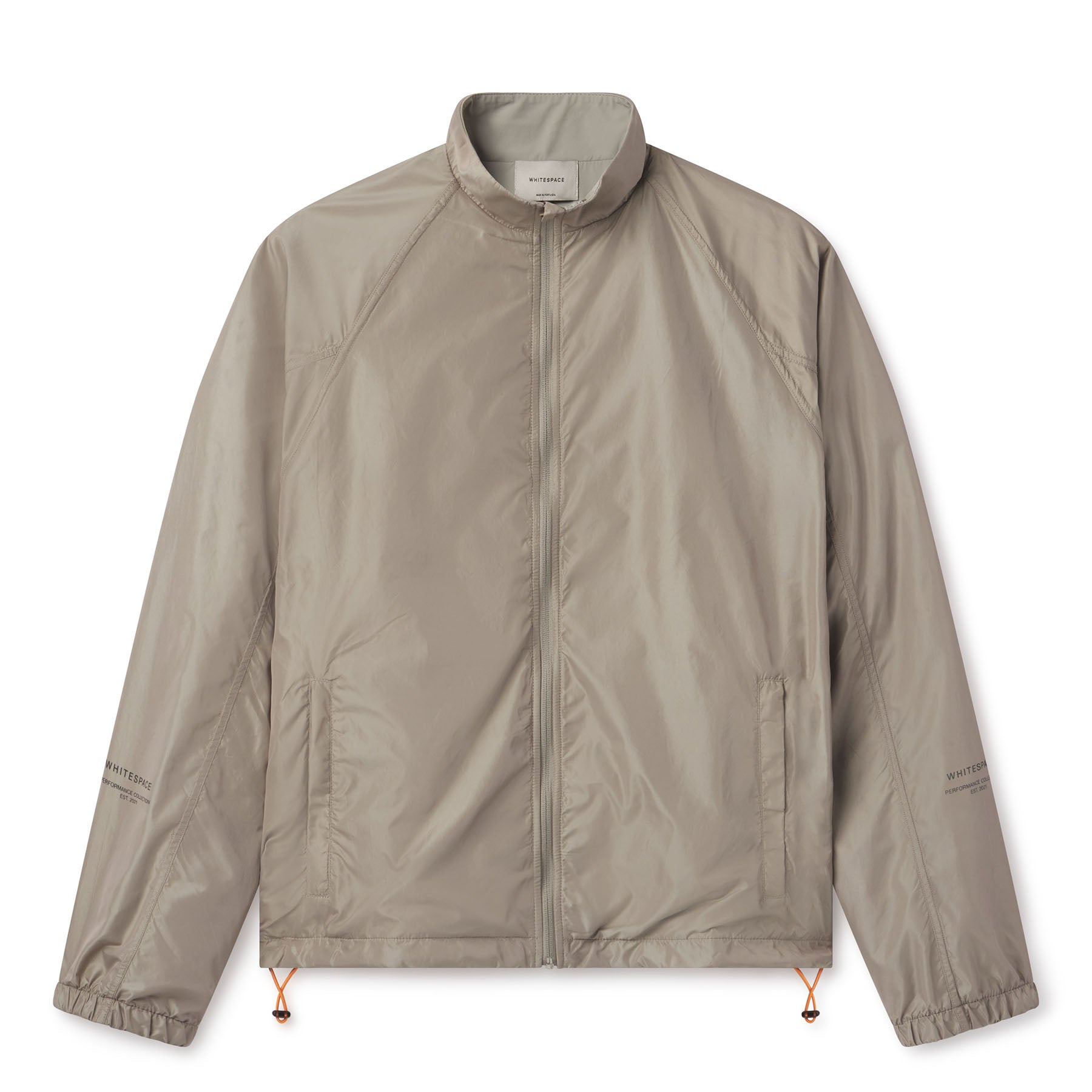 Lightweight comfort, fast-drying performance, and minimalist design. Image of WHITESPACE Windbreaker Jacket