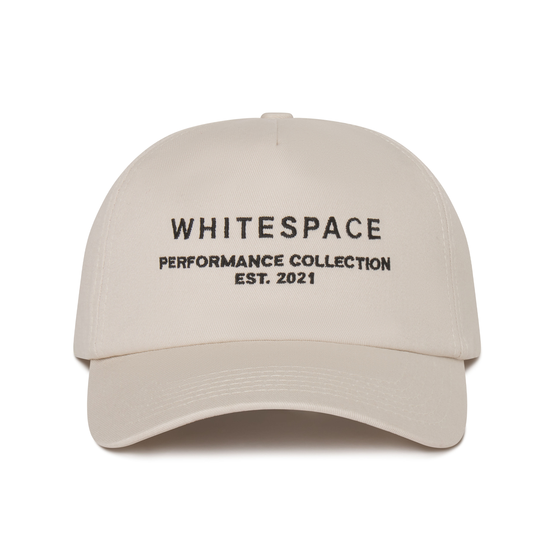 Beige cap with 'WHITESPACE PERFORMANCE COLLECTION EST. 2021' text on a white background