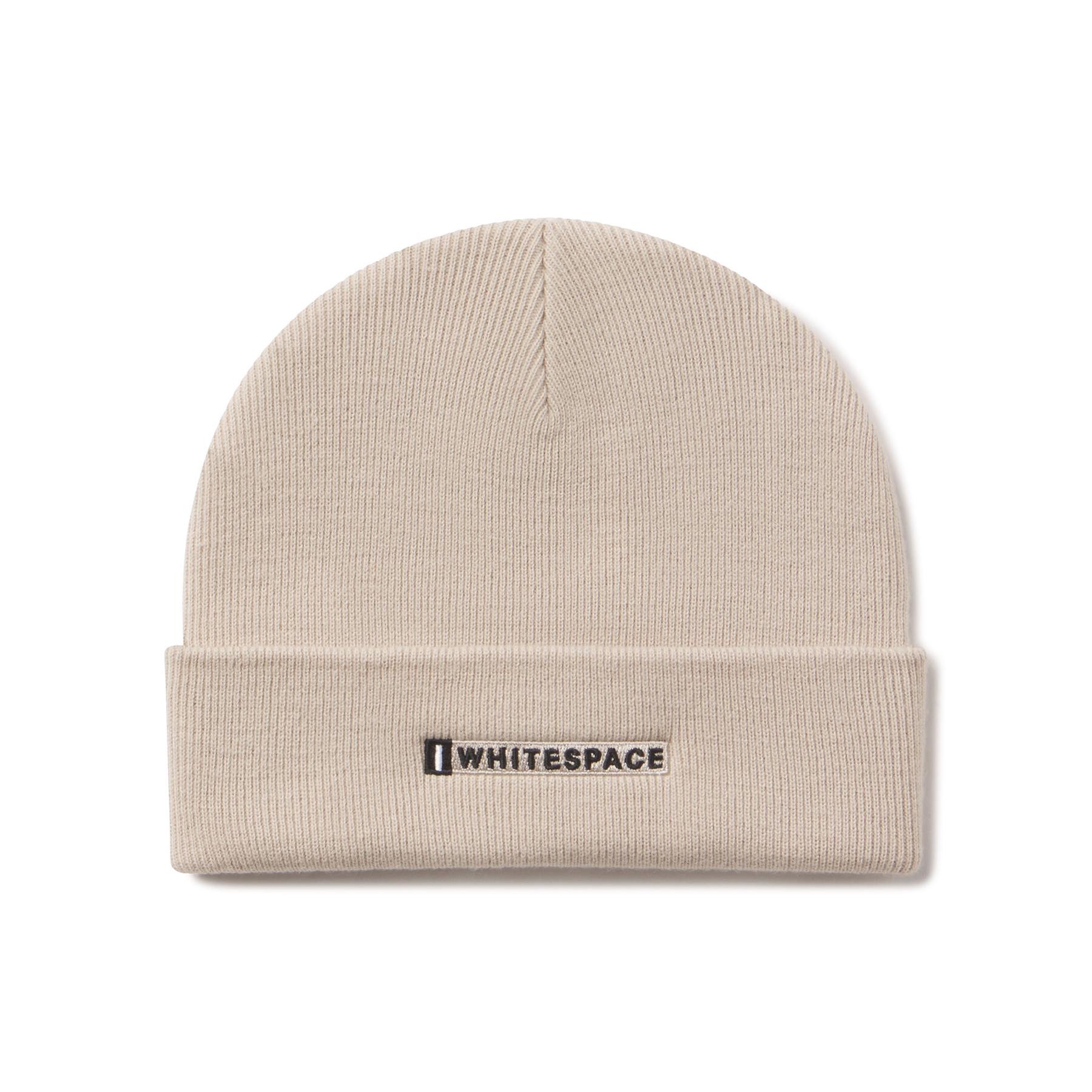 Beige beanie with 'Whitespace' logo on a white background