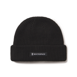 Black beanie with a 'Whitespace' label on a white background