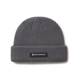 Gray knit beanie with a 'Whitespace' label on a white background