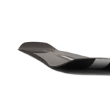 Black snowboard on a white background