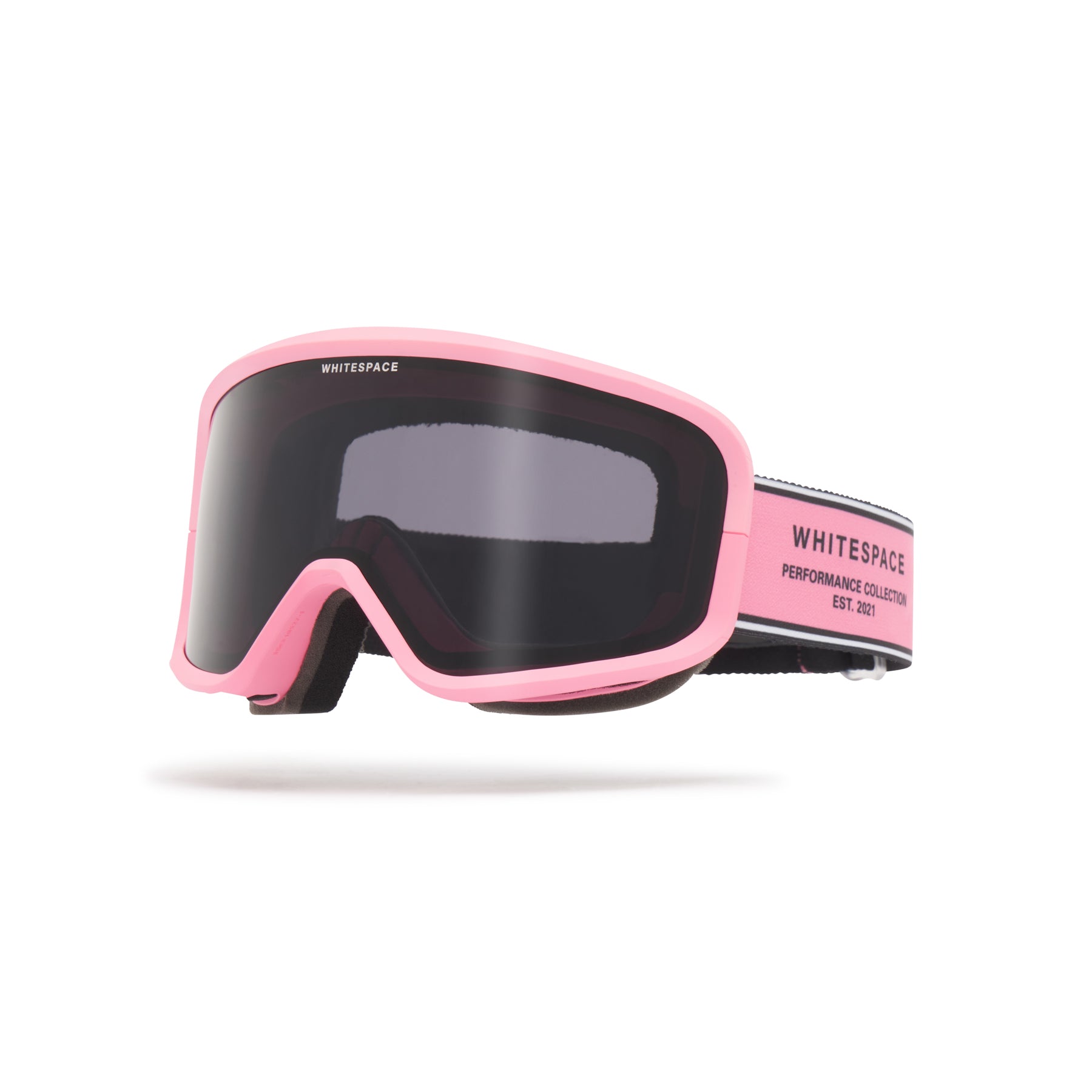 Dark tinted goggles in Pink Icing colorway with 'Whitespace' branding on a white background