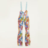 Flat lay of Farm Rio Macaw riding bib pants, light blue colored bibs with blue macaws and tropical leaves over the entire pants, on a white background.