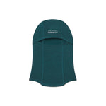 Teal balaclava with WHITESPACE logo on a white background