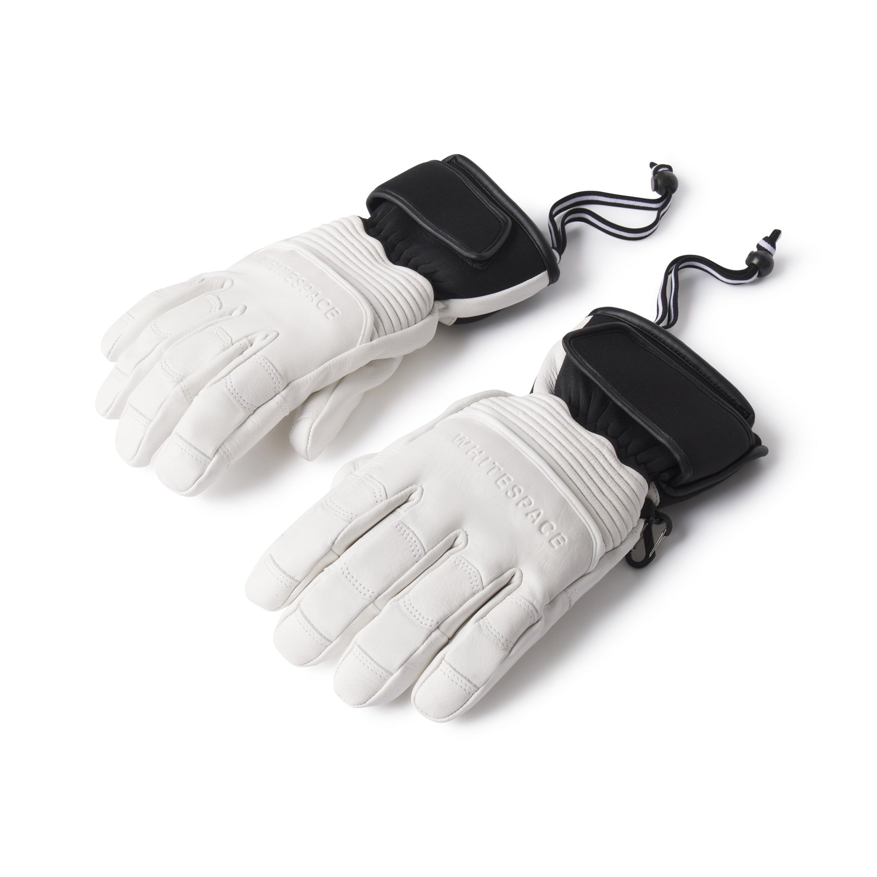 White gloves with black accents on a white background.  Brand logo across back of hand.