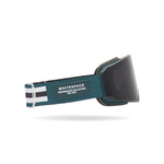 Dark tinted ski goggles with deep blue strap featuring 'Whitespace' branding on a white background, from a side view.