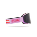 Lilac goggles with a black lens on a white background, brand logo shows on strap.
