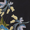Floral pattern with yellow flowers and blue leaves on a black background