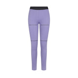 Purple leggings with 'whitespace' branding on a white background