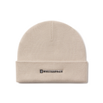 Beige beanie with 'Whitespace' logo on a white background