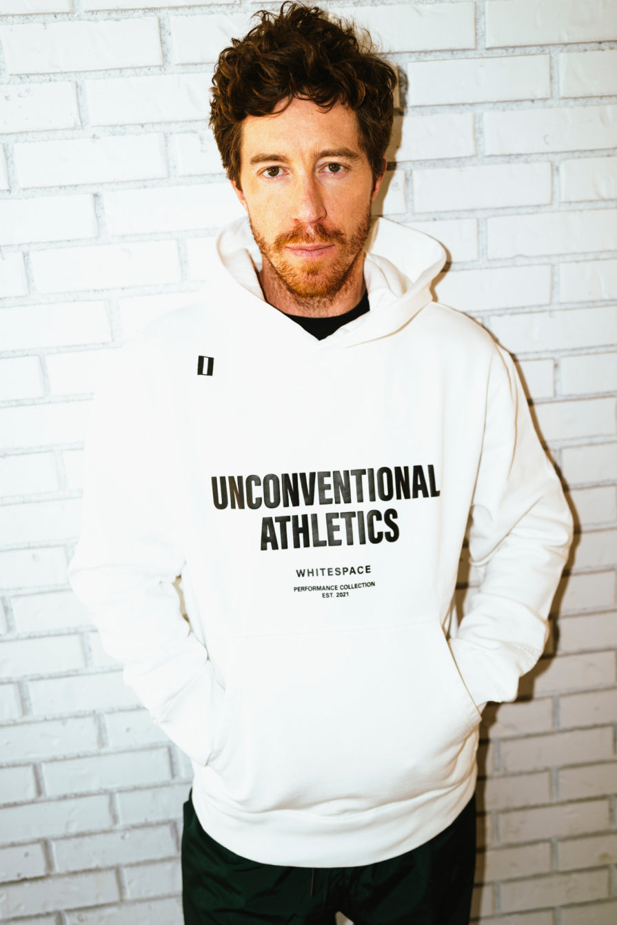 Shaun White wearing the Unconventional Athletics Hoodie in Whisper White
