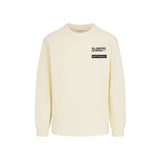 Beige long-sleeved tee shirt with WHITESPACE logo on the chest against a white background