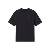 Black t-shirt with a small white WHITESPACE logo on the front chest, on a white background 