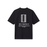 Black t-shirt with WHITESPACE logo on the back, on a white background
