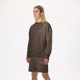 Model wearing WHITESPACE Fleece Crewneck in slate black and slate black fleece shorts, shown from the knees up, against a white background.