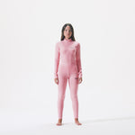 Video of model wearing women's merino baselayer kit in pink icing.