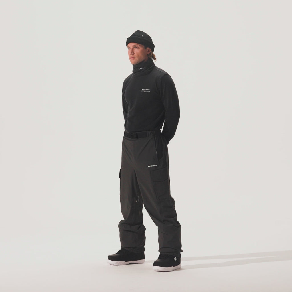 Video of model wearing AMF Riding Pant in Phantom colorway and coordinating black shirt and beanie.