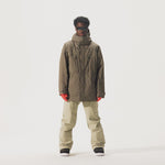 Video of model wearing beige pants and Whitespace Parka Jacket in Falcon colorway.